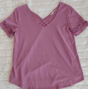 purple/pink cross neck shirt
